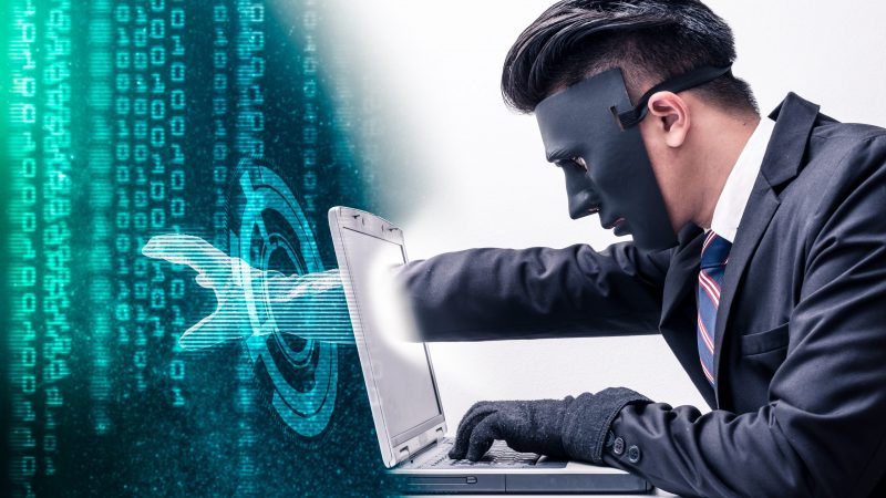 man operating computer - cyber security