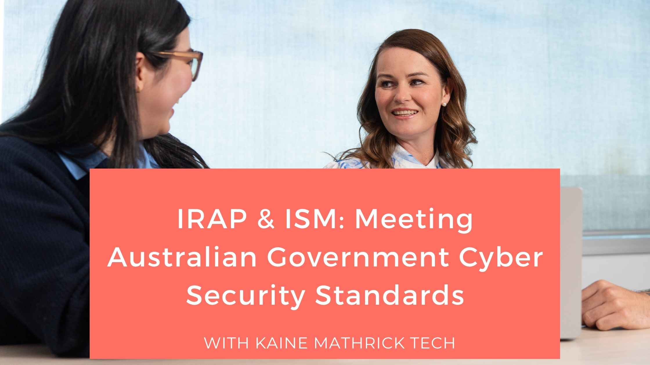 Consultants discussing IRAP and ISM requirements to meet Australian Government cyber security standards.
