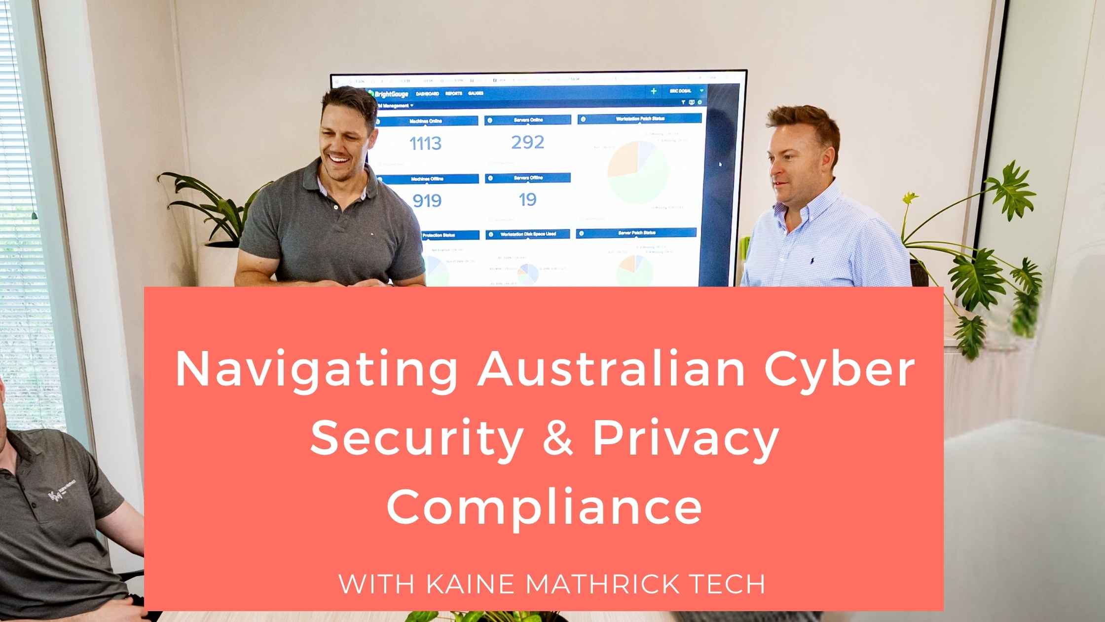 Kaine Mathrick Tech blog banner on navigating Australian cyber security and privacy compliance, featuring a workplace presentation with a security dashboard in the background.